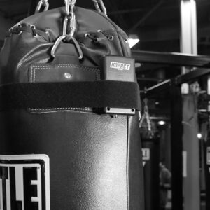 Close-up of an Impact Wrap heavy bag sensor that tracks strikes on a punching bag.