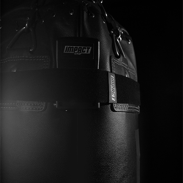 Close-up of an Impact Wrap heavy bag sensor that tracks strikes on a punching bag.